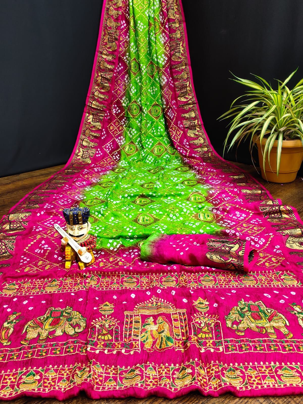 Pure Bandhej silk saree with zari weaving border.
